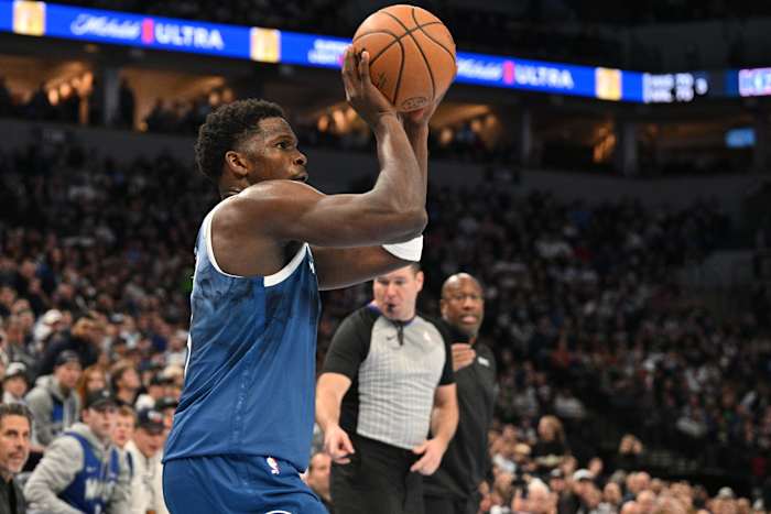 Nov 24, 2023; Minneapolis, Minnesota, USA; Minnesota Timberwolves guard Anthony Edwards (5) shoots the ball against the Sacramento Kings during the third quarter at Target Center.